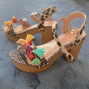 Betsy Johnson sandals w/ animal print strap with sea shell and tassels.  Size 7